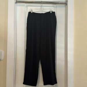 Free People linen blend, pleated front trouser.  Flowy snd light fabric.